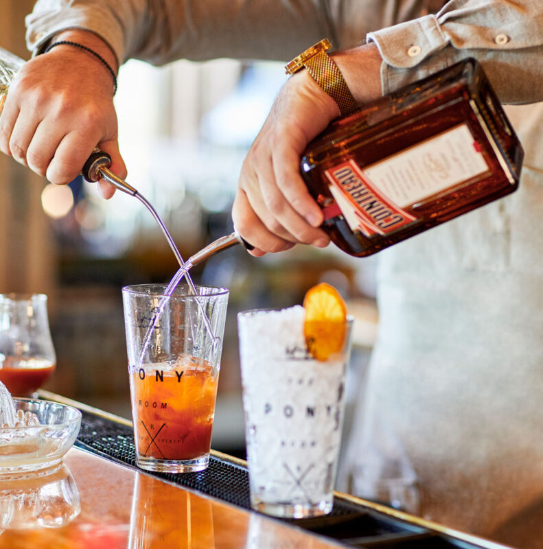 bartender mixing drink at Pony Room bar
