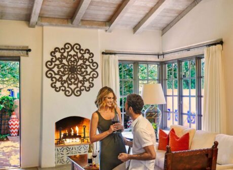 couple sitting in Valencia suite living room