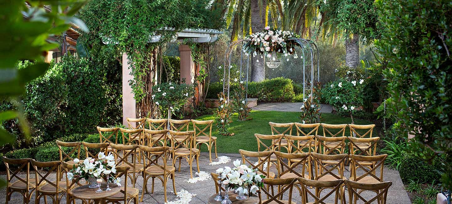 Rose garden with small wedding ceremony setup