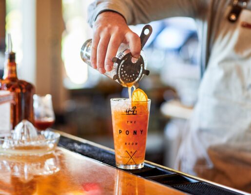 bartender pouring drink at Pony Room