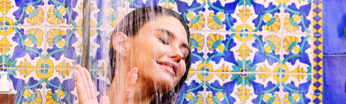 Woman taking a spa shower
