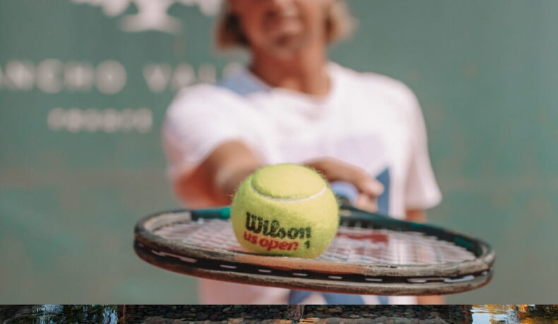 Close up of tennis ball on a racket