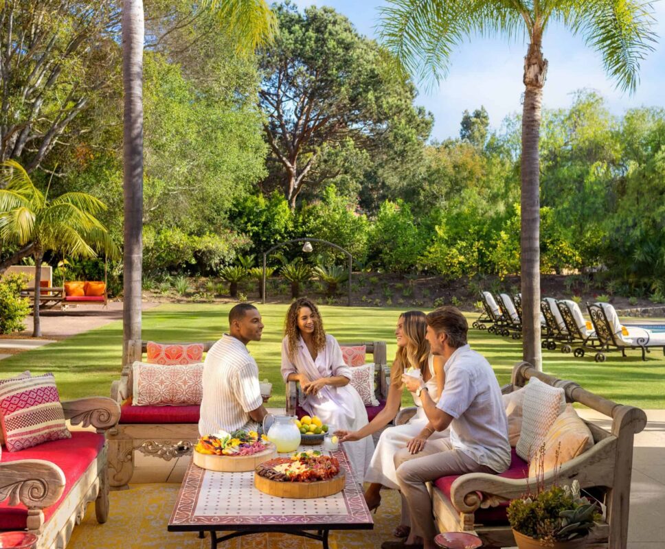 two couples on Casa Valencia patio