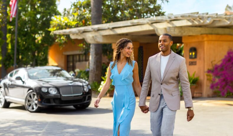 African American couple walking away from ubhouse