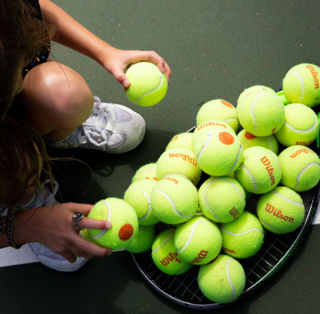 a pile of tennis balls