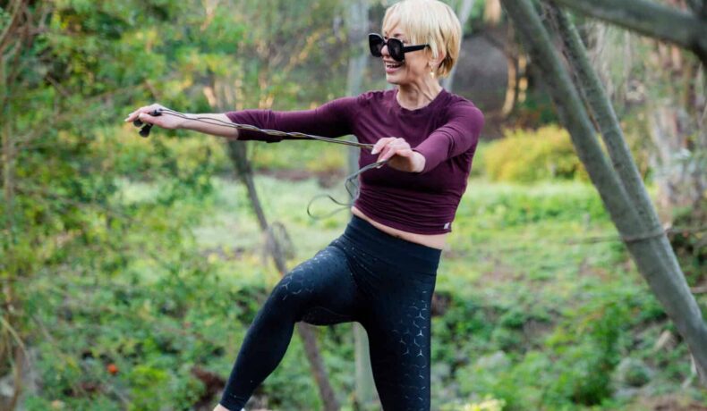 a woman exercising outside