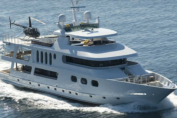 Yacht with helicopter on the deck.