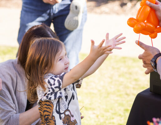 Little Girl with a balloon animal