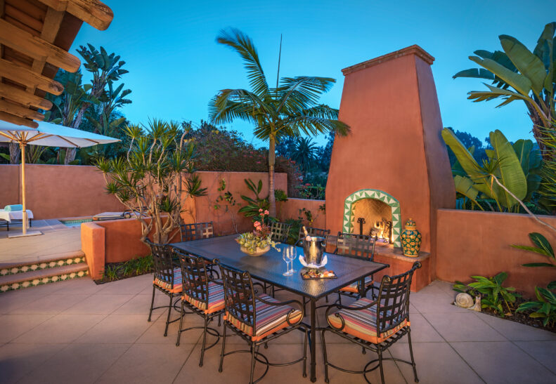 Rancho Valencia Villas Patio with Fireplace at Sunset