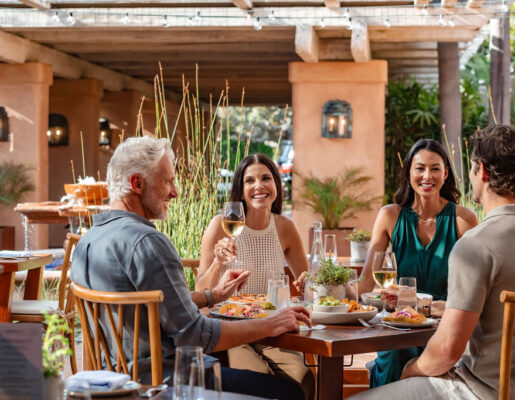 Couples dining on Fountain courtyard
