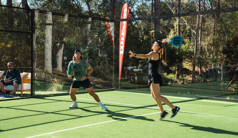 Man and woman playing Padel