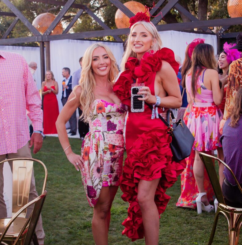 Two ladies in cocktail dresses at the After Pony Party