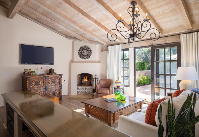 Eucalyptus ADA King Suite living area with fireplace in corner