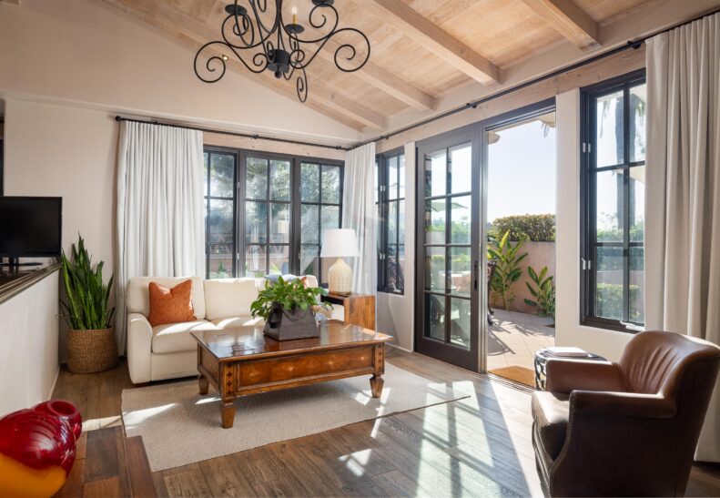 Olive Grove King Living Area with door open to patio