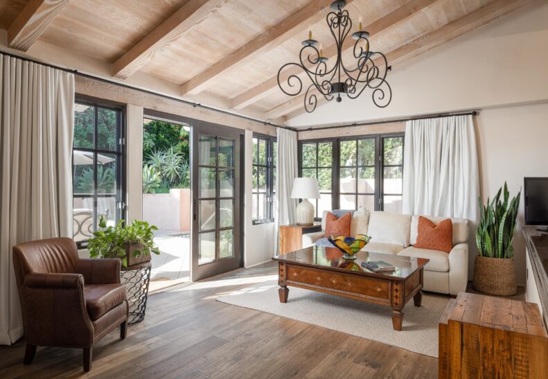 Olive Grove Two Queen ADA living area and door to patio