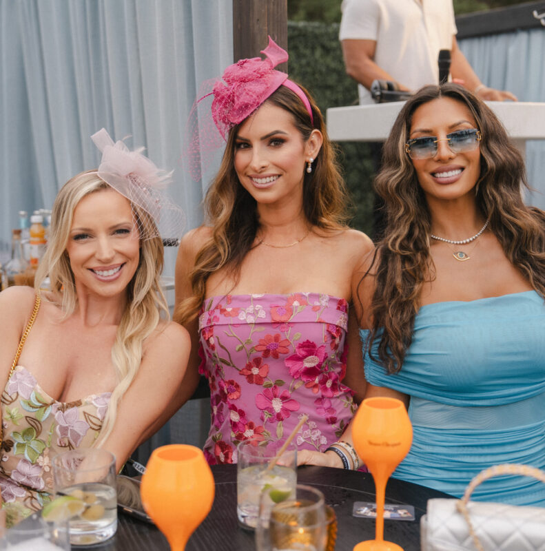 Ladies smiling at the After Pony Party