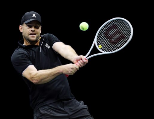 Andy Roddick hitting a tennis ball.