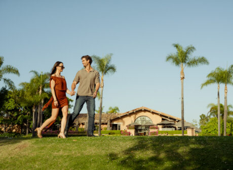 Couple walking on the lawn